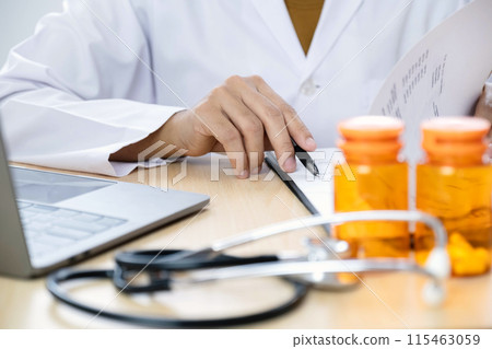 The female doctor sat and checked the patient's history and used a laptop to record patient information at the hospital. Medical concepts and interests The female doctor sat and checked the patient's history and used a laptop to record patient information at the hospital. Medical concepts and interests 115463059