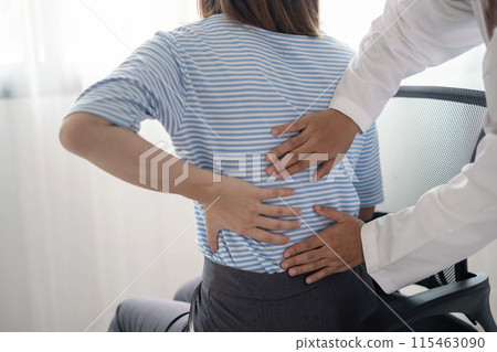 Female physiotherapists provide physical assistance to women patients with back injuries back massages for relaxation and muscle recovery in the rehabilitation center Female physiotherapists provide physical assistance to women patients with back injuries back massages for relaxation and muscle recovery in the rehabilitation center 115463090