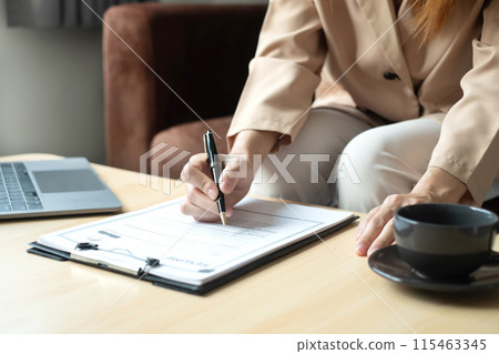 Business woman employer holding resume hiring recruit looking cv resume to hire candidates, analyzing information before job interview. Recruitment concepts Business woman employer holding resume hiring recruit looking cv resume to hire candidates, analyzing information before job interview. Recruitment concepts 115463345