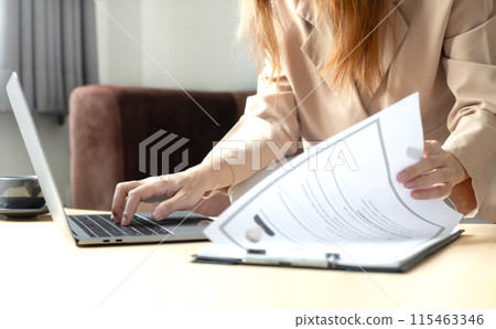 Business woman employer holding resume hiring recruit looking cv resume to hire candidates, analyzing information before job interview. Recruitment concepts Business woman employer holding resume hiring recruit looking cv resume to hire candidates, analyzing information before job interview. Recruitment concepts 115463346