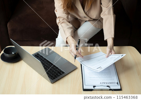 Business woman employer holding resume hiring recruit looking cv resume to hire candidates, analyzing information before job interview. Recruitment concepts Business woman employer holding resume hiring recruit looking cv resume to hire candidates, analyzing information before job interview. Recruitment concepts 115463368
