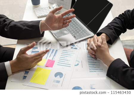 Business leaders talk about charts, financial graphs showing results are analyzing and calculating planning strategies, business success building processes 115463430