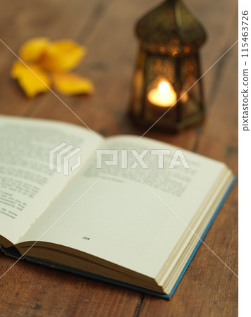 Image of reading by candlelight Image of reading by candlelight 115463726