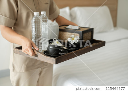 The housekeeper hotel cleans and arranges things in order. prepares to welcome VIP guests 115464377