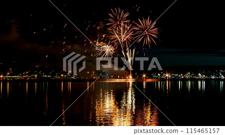 Fireworks reflected in the water 115465157