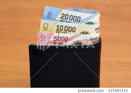 Malagasy ariary in the black wallet 115465332