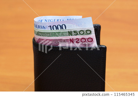 Nigerian naira in the black wallet Nigerian naira in the black wallet 115465345