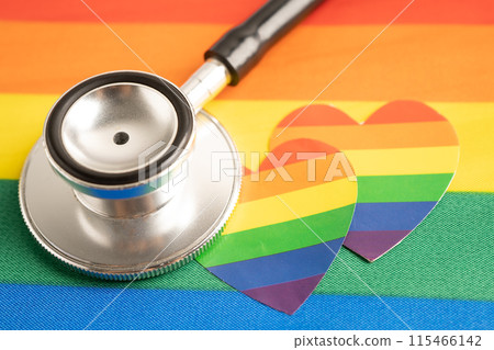 Black stethoscope on rainbow flag with heart, symbol of LGBT pride month celebrate annual in June social, symbol of gay, lesbian, bisexual, transgender, human rights and peace. 115466142
