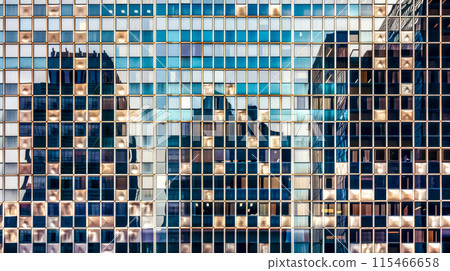 Urban reflections on modern glass facade 115466658