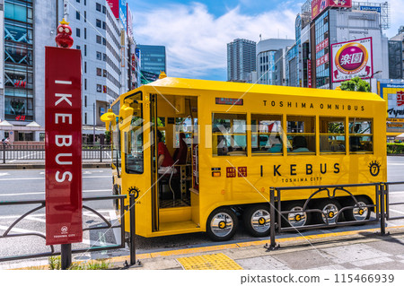 Tokyo cityscape in Japan, with a view of the yellow Ikebus that brings happiness, etc. - June 12th, east exit of Ikebukuro Station 115466939