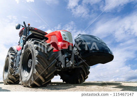 Modern red agricultural tractor bottom view. 115467147