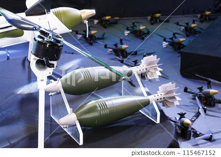 Military drones armed with bombs. Military drones armed with bombs. 115467152
