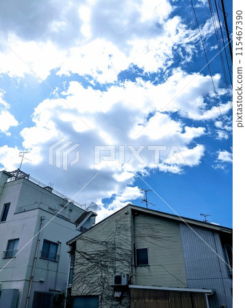 Blue skies above a residential area Blue skies above a residential area 115467390