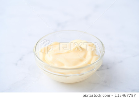 Mayonnaise served on a small plate Mayonnaise served on a small plate 115467787