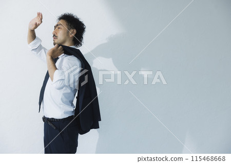 A hot-looking man in a suit A hot-looking man in a suit 115468668