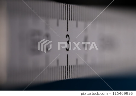 Ruler in macro, centimeters, white ruler Ruler in macro, centimeters, white ruler 115469956