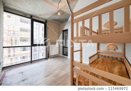Comparison of children room with wooden bunk bed before and after restoration. Old apartment room with brick wall and new renovated flat with parquet floor and kid house bed. Comparison of children room with wooden bunk bed before and after restoration. Old apartment room with brick wall and new renovated flat with parquet floor and kid house bed. 115469972