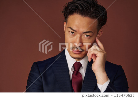 Businessman wearing a suit Businessman wearing a suit 115470625