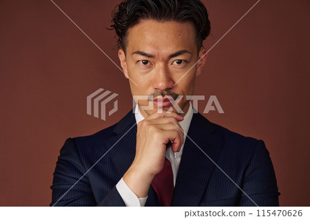 Businessman wearing a suit Businessman wearing a suit 115470626