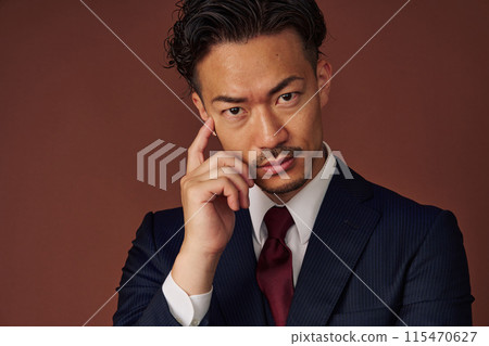 Businessman wearing a suit Businessman wearing a suit 115470627