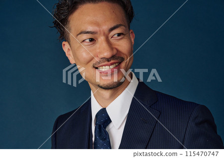 Businessman wearing a suit Businessman wearing a suit 115470747