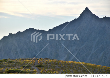Sunrise view from Mt. Sugoroku, runway in the sky and Mt. Yari Sunrise view from Mt. Sugoroku, runway in the sky and Mt. Yari 115471503