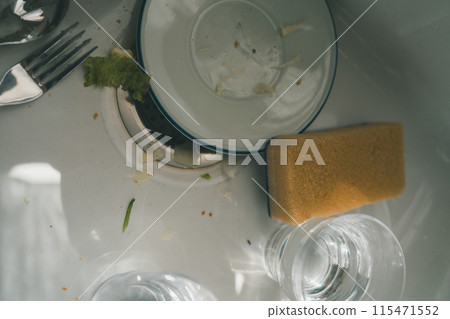 Dishes left in the sink 115471552