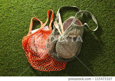 Eco bag, reusable, for shopping, on grass. 115473107