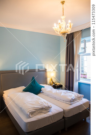 Tourist hotel bedroom, overseas, Austria 115473309