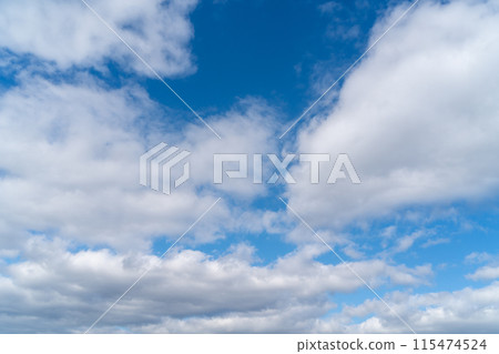Cloudy winter blue sky 115474524