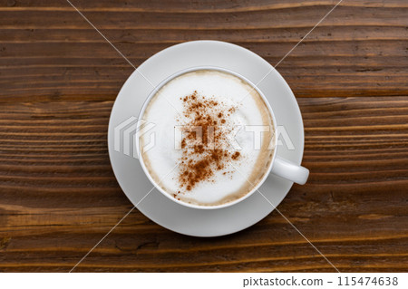 Top view of cappuccino on wooden table 115474638
