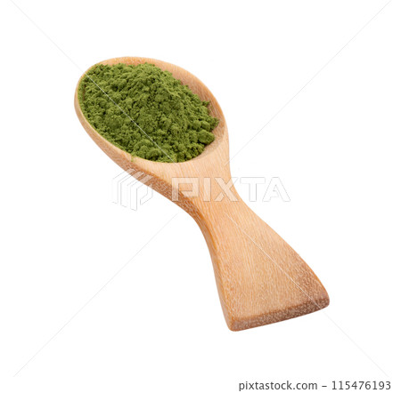 matcha green tea powder in wood spoon on white background 115476193