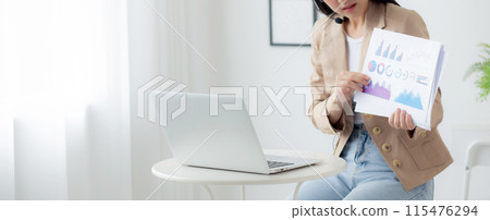 Young asian business woman using laptop computer for video conference online. Young asian business woman using laptop computer for video conference online. 115476294