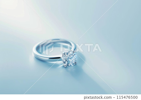 A diamond ring is on a table on a bright background 115476500