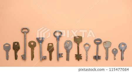 Key pattern. Background from different old keys. view from above. Key pattern. Background from different old keys. view from above. 115477084