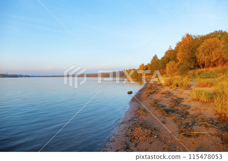 Autumn landscape sunset in the forest by the lake 115478053