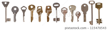 Set of different keys isolated on white background. Old door key made of yellow and white metal. Set of different keys isolated on white background. Old door key made of yellow and white metal. 115478543