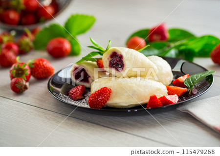 cooked sweet homemade steamed dumplings with strawberries cooked sweet homemade steamed dumplings with strawberries 115479268