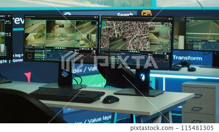 Empty agency office works on traffic surveillance with CCTV security system, public safety monitoring. Observation room with computers and a big screen deals with radar and satellite reconnaissance. Empty agency office works on traffic surveillance with CCTV security system, public safety monitoring. Observation room with computers and a big screen deals with radar and satellite reconnaissance. 115481305