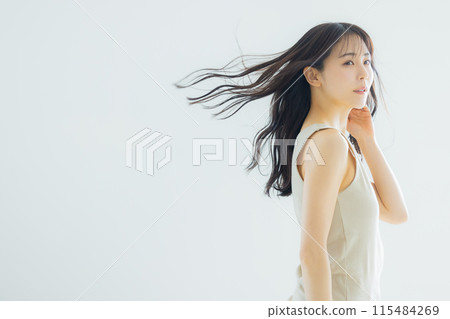 A woman with flowing hair 115484269