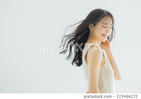 A woman with flowing hair 115484272