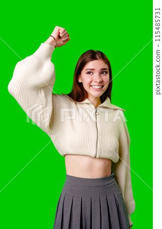 Woman in Skirt and Sweater Posing for Picture 115485731