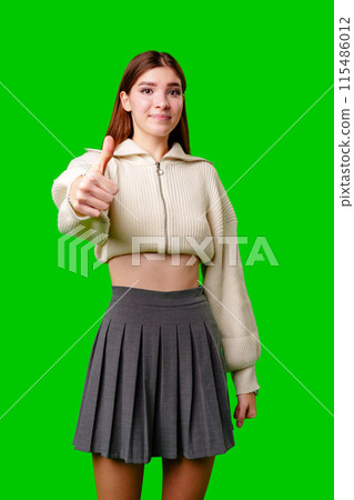 Smiling Girl in Skirt Giving Thumbs Up Smiling Girl in Skirt Giving Thumbs Up 115486012