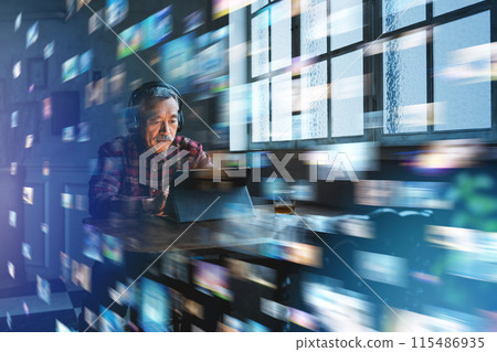 Senior man looking at tablet 115486935