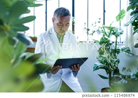 Scholar in white coat Scholar in white coat 115486974