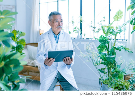 Scholar in white coat Scholar in white coat 115486976