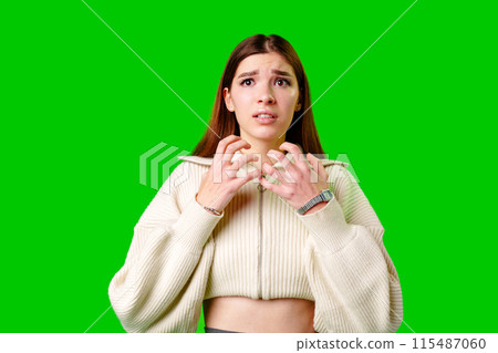 Woman in White Sweater Making Gesture Woman in White Sweater Making Gesture 115487060