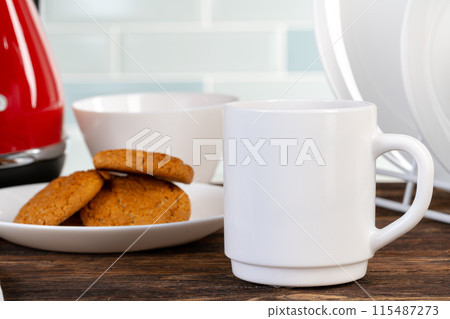 Tea served on a wooden kitchen table 115487273