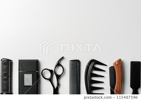 Set of barber tools for haircut on gray background flat lay 115487396
