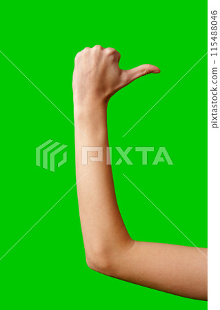 Person Giving a Thumbs Up Gesture Against a Green Screen Background 115488046